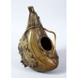A GOOD ORIENTAL BRONZE GOURD SHAPED POURER, with applied carved decoration of leaf & vine, the