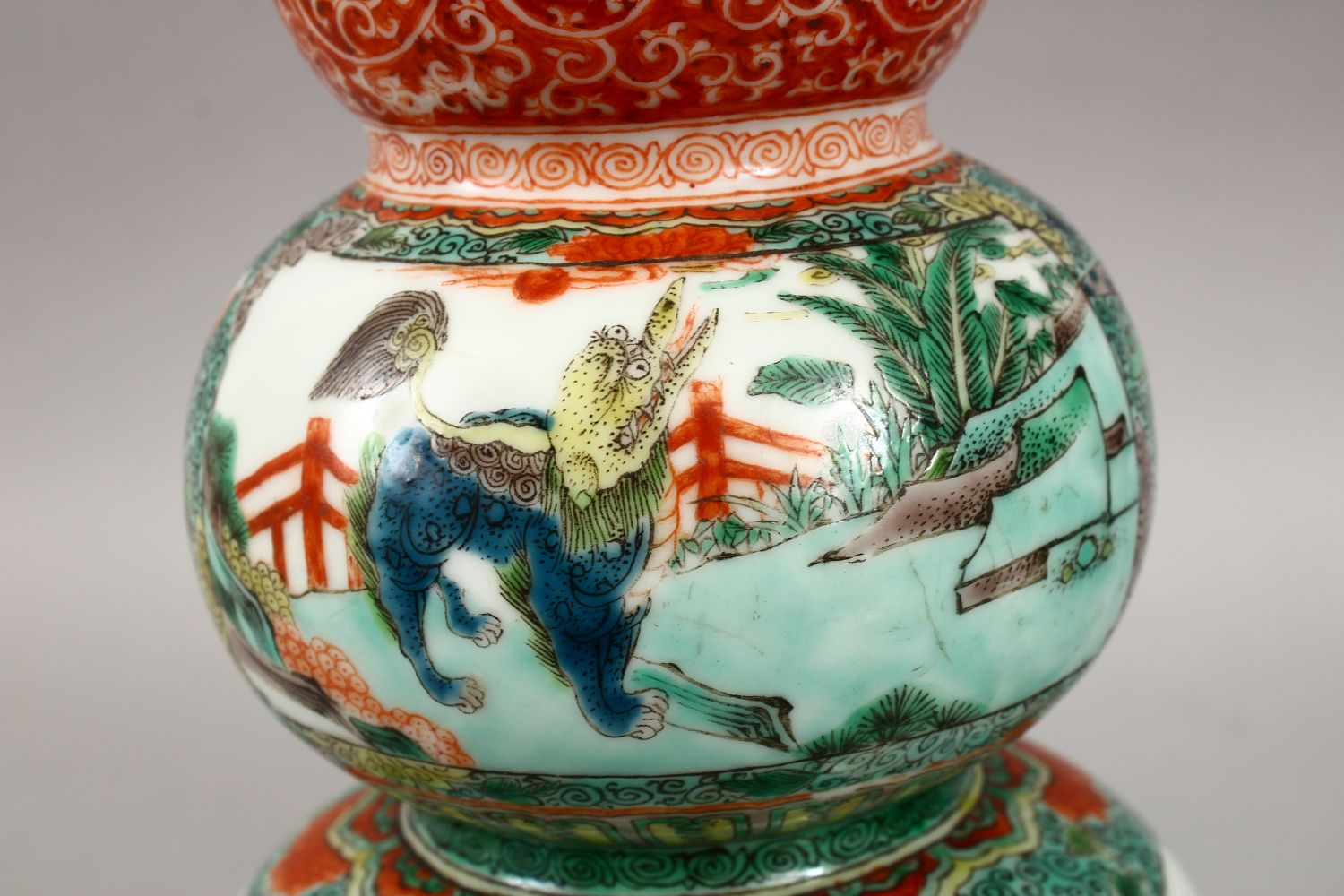 A PAIR OF CHINESE FAMILLE VERTE TRIPLE GOURD PORCELAIN VASES, decorated with panels of lion dogs - Image 5 of 9