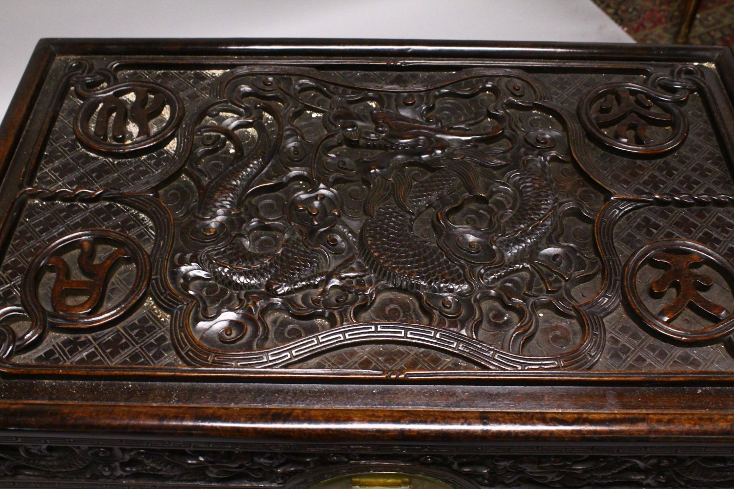 A GOOD 19TH CENTURY CHINESE CARVED HARDWOOD / HONGMU DRAGON CARVED LIDDED CHEST, the panels of the - Image 3 of 9