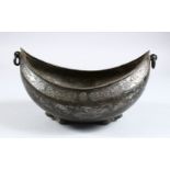 A LARGER BRONZE KASHKOOL, decorated with engraved calligraphy, 24cm x 14cm