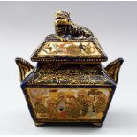 A JAPANESE MEIJI PERIOD TWIN HANDLE SATSUMA LIDDED KORO, the blue ground with panel decoration of