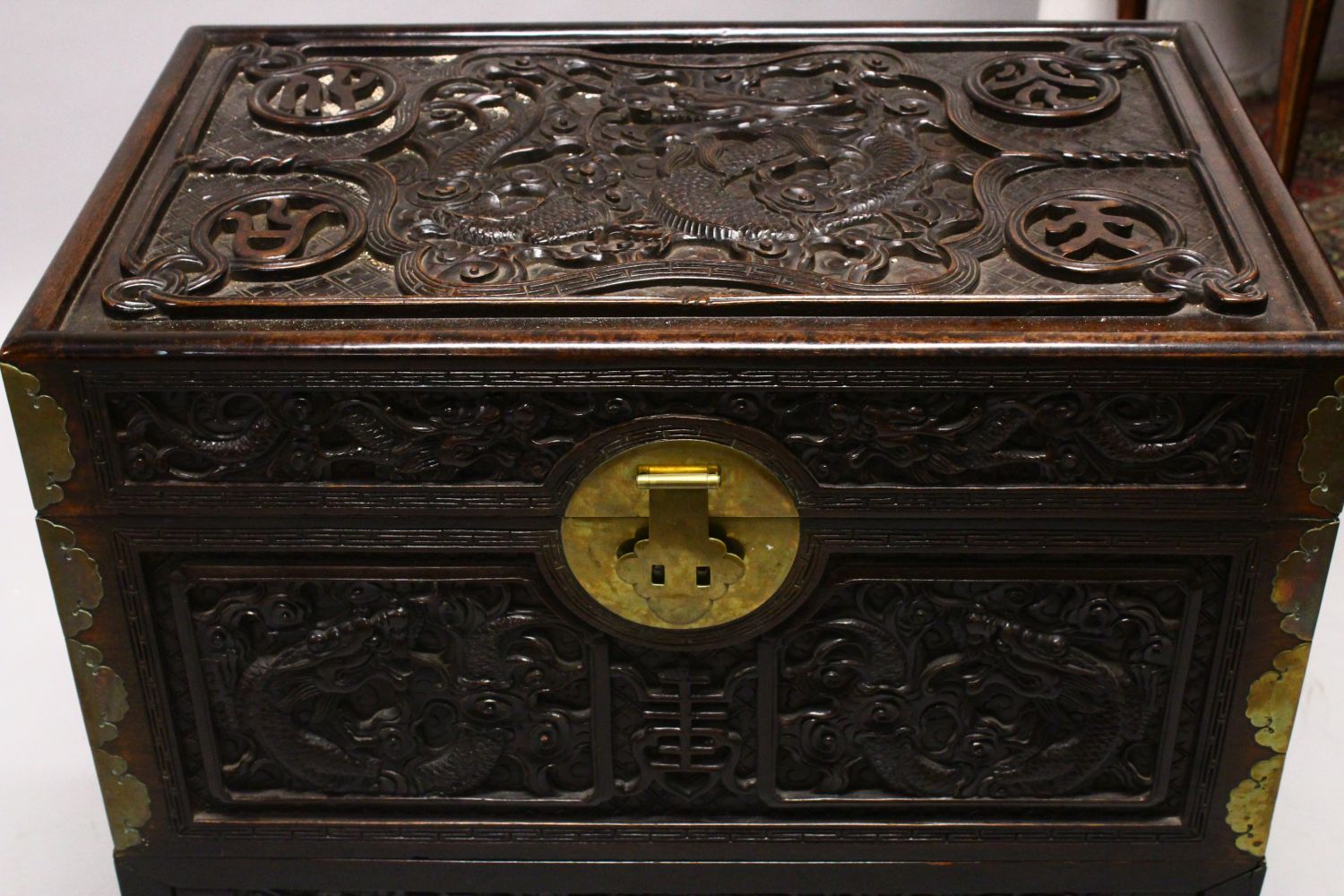 A GOOD 19TH CENTURY CHINESE CARVED HARDWOOD / HONGMU DRAGON CARVED LIDDED CHEST, the panels of the - Image 2 of 9