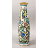 AN EARLY UNUSUAL SHAPE QAJAR POTTERY VASE, decorated with a figure amongst native flora, 40cm high x