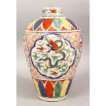 A GOOD CHINESE WUCAI PORCELAIN JAR & COVER, the body with panel decoration depicting five claw