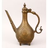 AN 18TH CENTURY MUGHAL INDIAN BRASS EWER, with chiselled and carved decoration, 28cm high.