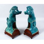 A GOOD PAIR OF CHINESE MING DYNASTY / STYLE TURQUOISE GLAZE POTTERY ROOF TILES ON STANDS, the