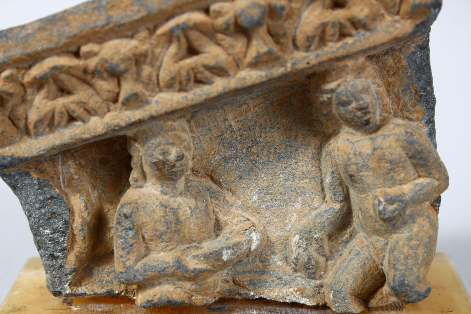 A GOOD EARLY GANDHARA ARCHITECTURAL FRAGMENT, mounted upon a stone base, 11.5cm high, 11.5cm - Image 3 of 4