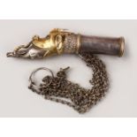 A GOOD 19TH CENTURY ISLAMIC SILVER & GILT SMOKING PIPE IN THE FORM OF A DOG, the eyes inlaid with