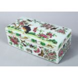 A GOOD 19TH CENTURY CHINESE CANTON FAMILLE ROSE PORCELAIN PEN BOX & COVER, the body decorated with