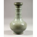 A CHINESE SONG STYLE GE WARE LONG NECK PORCELAIN VASE, the body moulded and ribbed, 22cm high x 13cm
