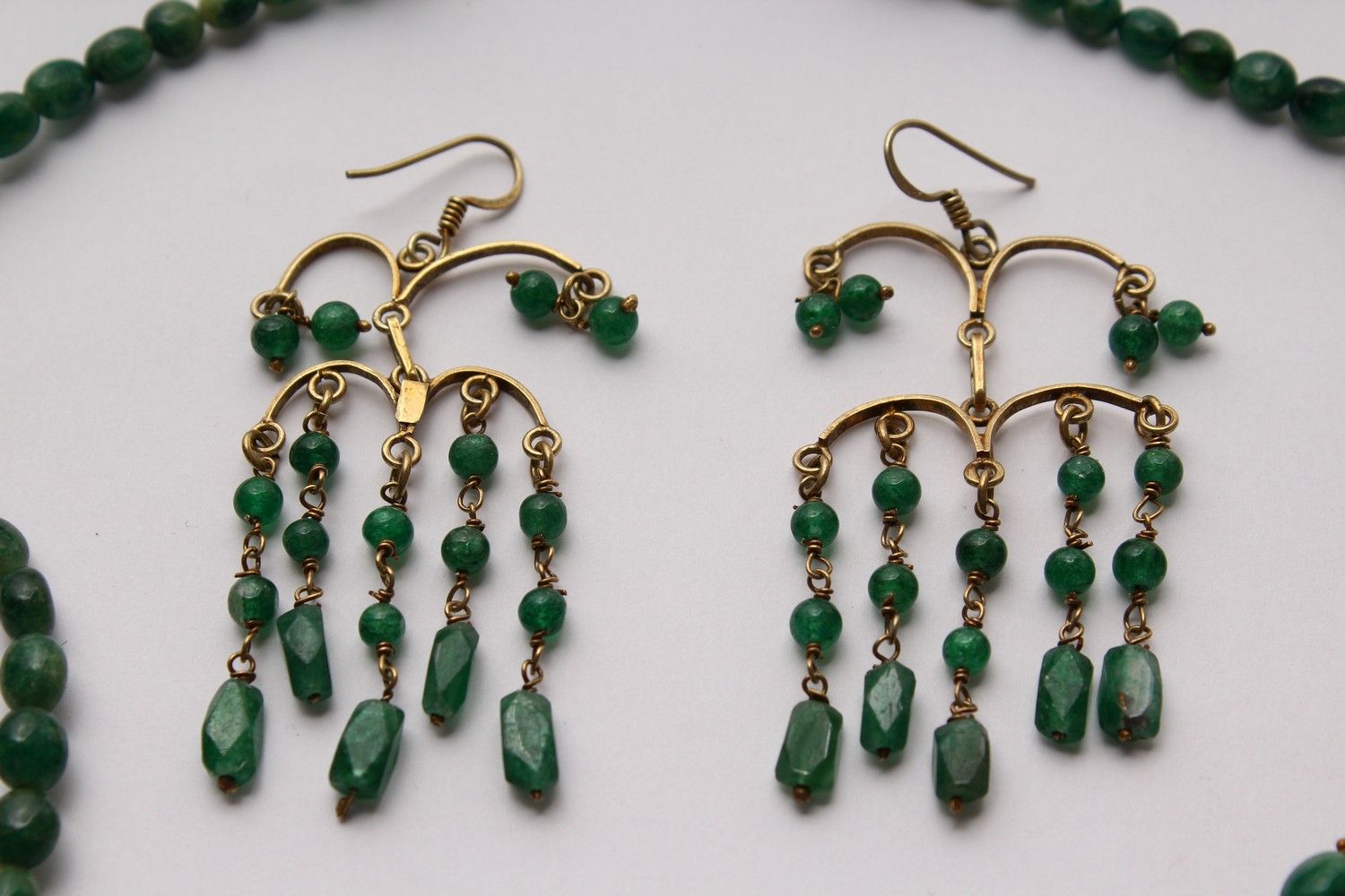 A SMALL GREEN BEAD NECKLACE, possibly natural emeralds, together with a pair of similar style - Image 2 of 3