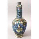A GOOD UNUSUAL SHAPE 19TH CENTURY PERSIAN POTTERY VASE, decorated with panels of figures and