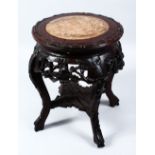 A 19TH CENTURY CHINESE CARVED HARDWOOD & MARBLE TOP PLANT STAND, the top inset with marble and