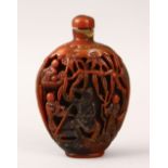 A 19TH CENTURY CHINESE CARVED HORN / SHELL SNUFF BOTTLE, carved in relief to depict figures in