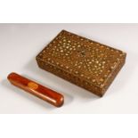 TWO 19TH CENTURY INDIAN WOODEN ITEMS, a pen box decorated with a roundel of calligraphy, 21cm