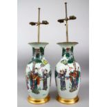 A PAIR OF 19TH CENTURY CHINESE FAMILLE ROSE PORCELAIN VASES / LAMPS, the body of the vases each
