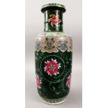 A 19TH CENTURY CHINESE FAMILLE NOIR PORCELAIN VASE, decorated upon a blac glaze with formal