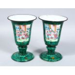 A GOOD PAIR OF 19TH CENTURY CHINESE CANTON ENAMEL GOBLETS, each decorated with two panels upon an