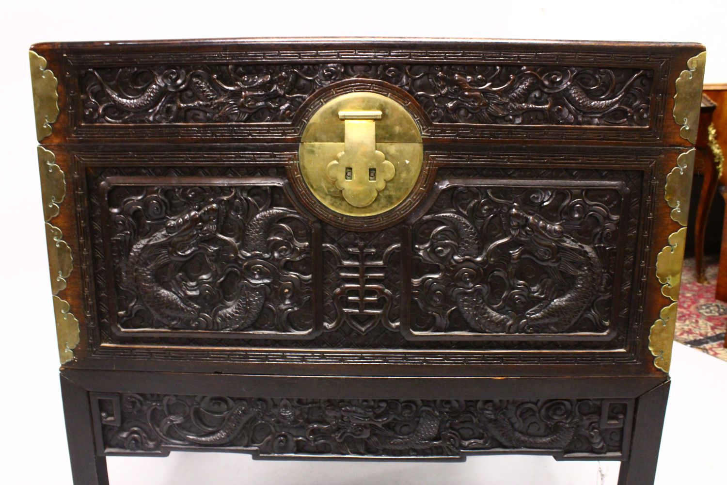 A GOOD 19TH CENTURY CHINESE CARVED HARDWOOD / HONGMU DRAGON CARVED LIDDED CHEST, the panels of the - Image 4 of 9