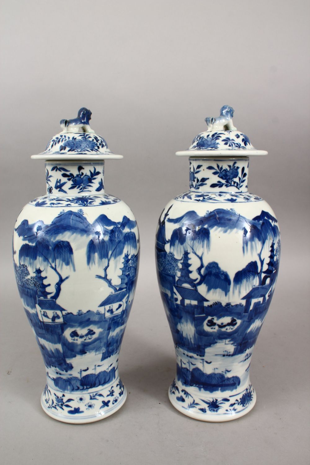 A PAIR OF 19TH CENTURY CHINESE BLUE & WHITE KANGXI STYLE PORCELAIN VASES & COVERS, the body of the - Image 3 of 8