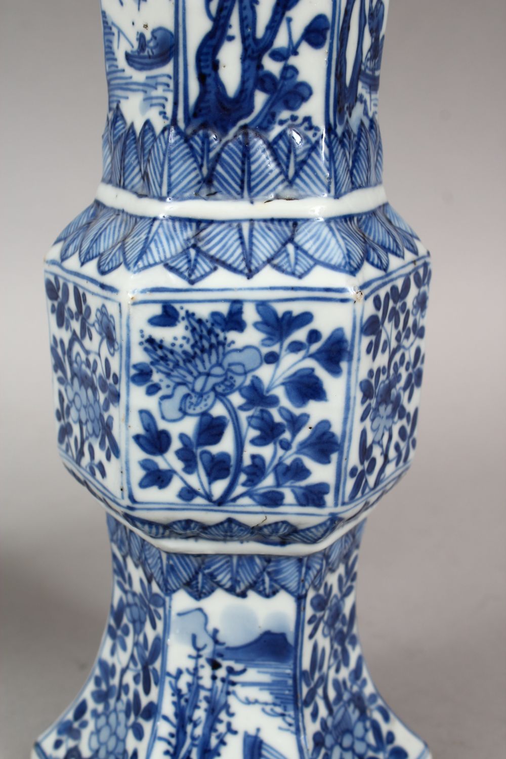 A GOOD PAIR OF 18TH CENTURY CHINESE KANGXI BLUE & WHITE GU SHAPE PORCELAIN VASES, with a multitude - Image 6 of 10