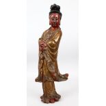 A GOOD 19TH CENTURY CHINESE CARVED WOOD & POLY CHROME DECORATED FIGURE OF GUANYIN, stood in