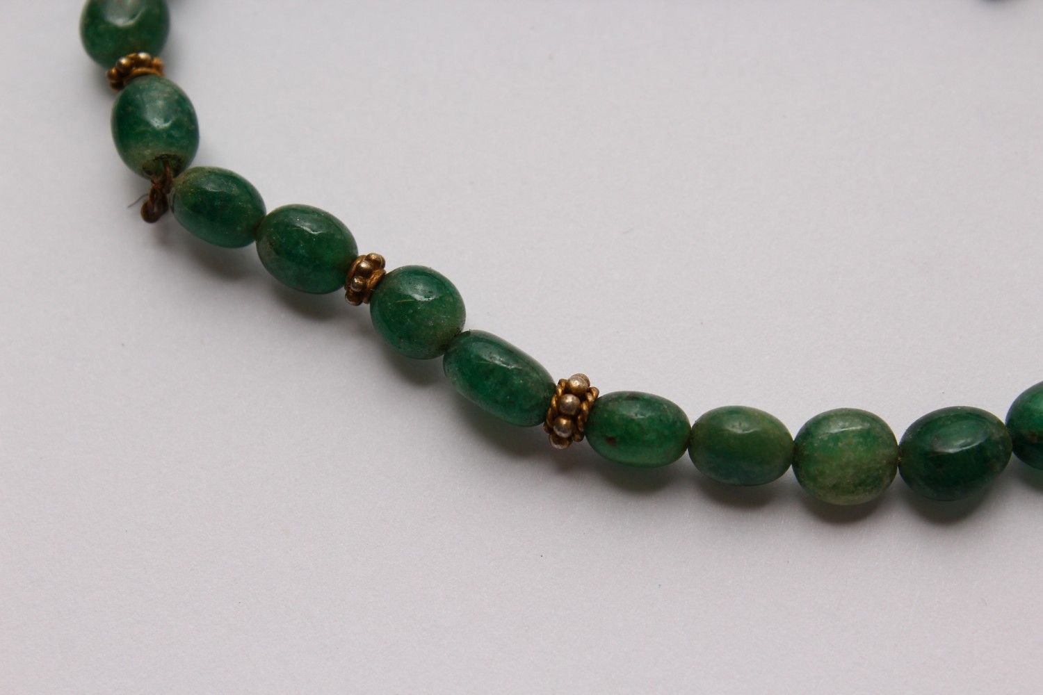 A SMALL GREEN BEAD NECKLACE, possibly natural emeralds, together with a pair of similar style - Image 3 of 3