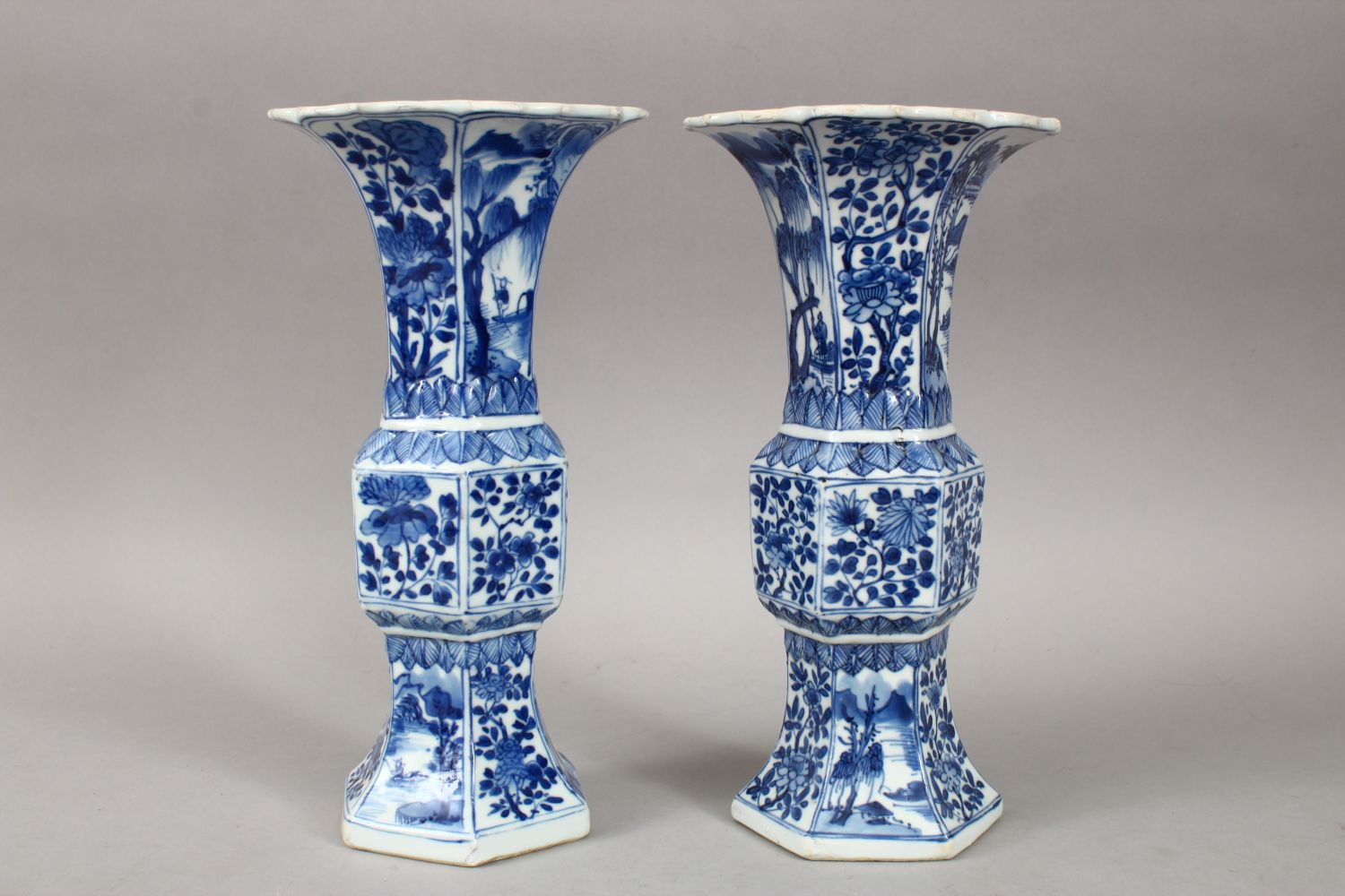 A GOOD PAIR OF 18TH CENTURY CHINESE KANGXI BLUE & WHITE GU SHAPE PORCELAIN VASES, with a multitude - Image 4 of 10