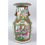 A 19TH CENTURY CANTON FAMILLE ROSE PORCELAIN TWIN HANDLE VASE, the body of the vase decorated with