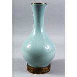 A 19TH CENTURY OR EARLIER CHINESE PALE CELADON / CLAIR DE LUNE PORCELAIN BOTTLE VASE, The vase