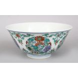 A CHINESE YONGZHENG STYLE DOUCAI PORCELAIN FLORAL BOWL, the body of the bowl decorated with