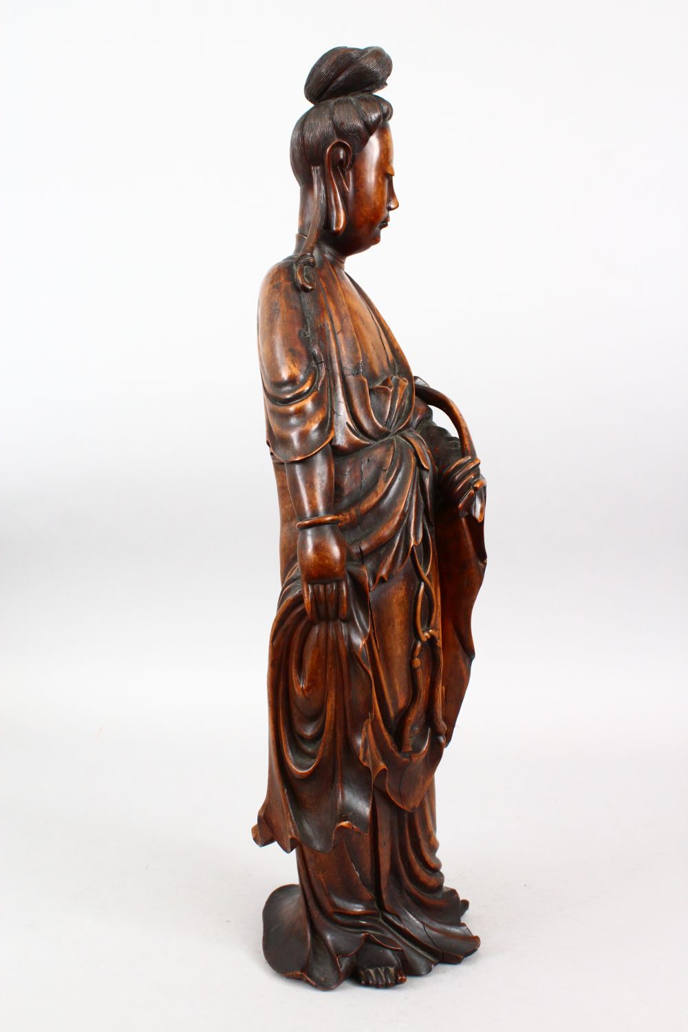A GOOD 19TH CENTURY CHINESE CARVED HARDWOOD FIGURE OF GUANYIN, stood in traditional attire and - Image 3 of 6