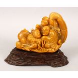 A GOOD CHINESE 19TH / 20TH CENTURY CARVED SOAPSTONE FIGURE OF LUOHAN & BUDDHA, carved to depict
