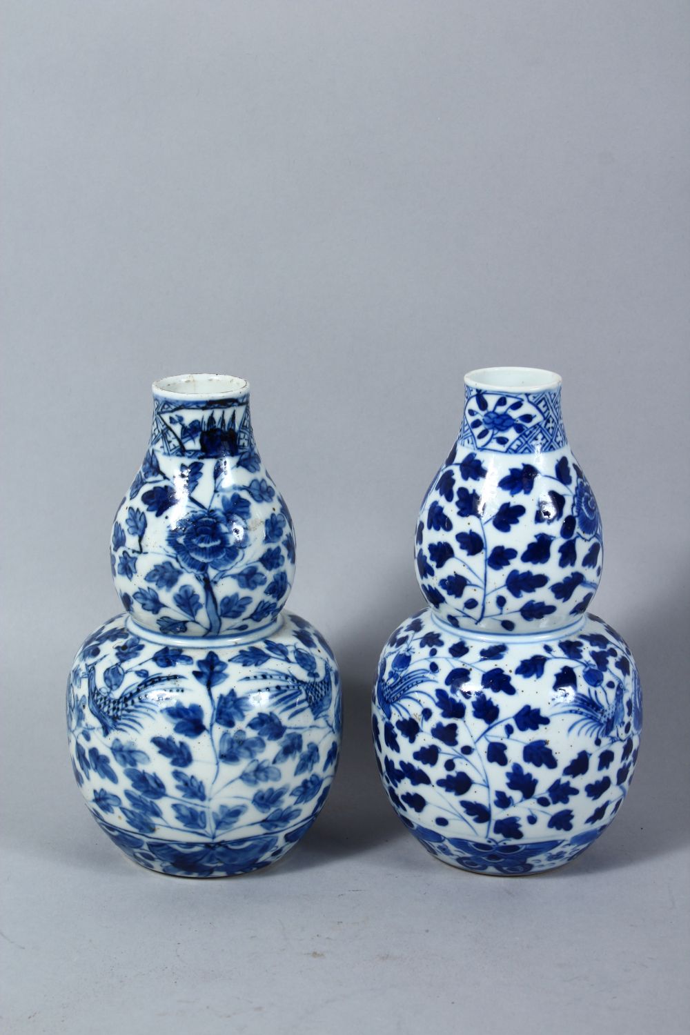 TWO CHINESE 19TH CENTURY BLUE & WHITE DOUBLE GOURD VASES, both painted with typical scenes of - Image 2 of 7