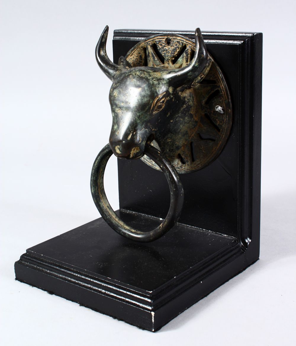 A GOOD 19TH CENTURY OR EARLIER CHINESE BRONZE DOOR KNOCKER OF AN OXEN / BULL, upon a mounted