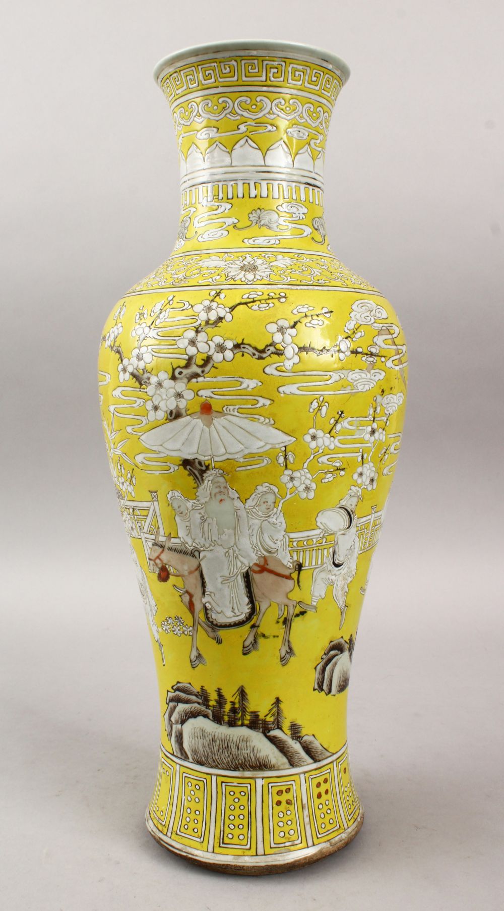 A 19TH CENTURY CHINESE FAMILLE ROSE YELLOW GROUND YIN PING SHAPED PORCELAIN VASE, decorated with