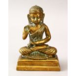 A 20TH CENTURY BRONZE FIGURE OF BUDDHA, in a seated meditating position, 13.5cm high x 9cm.