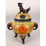 A LARGE 19TH / 20TH CENTURY CHINESE CLOISONNE TRIPOD CENSER, with twin moulded elephant handles, the