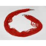 A GOOD CHINESE CORAL BEAD NECKLACE, 71cm long.