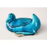 A GOOD 18TH / 19TH CENTURY JIAQING TURQUOISE FIGURE OF A DUCK, in a seated position, 18cm wide x