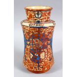 A GOOD 19TH CENTURY ISLAMIC / PERSIAN POTTERY MEDICINE JAR, with a coat of arm decoration to the