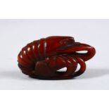 A 19TH CENTURY CHINESE CARVED HORN FIGURE OF A LOBSTER, carved in a curled position, 6cm wide.