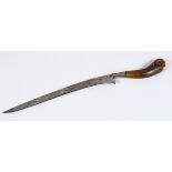 18TH / 19TH CENTURY MALAYSIAN RHINO HORN HANDLED DAGGER, 44cm long.