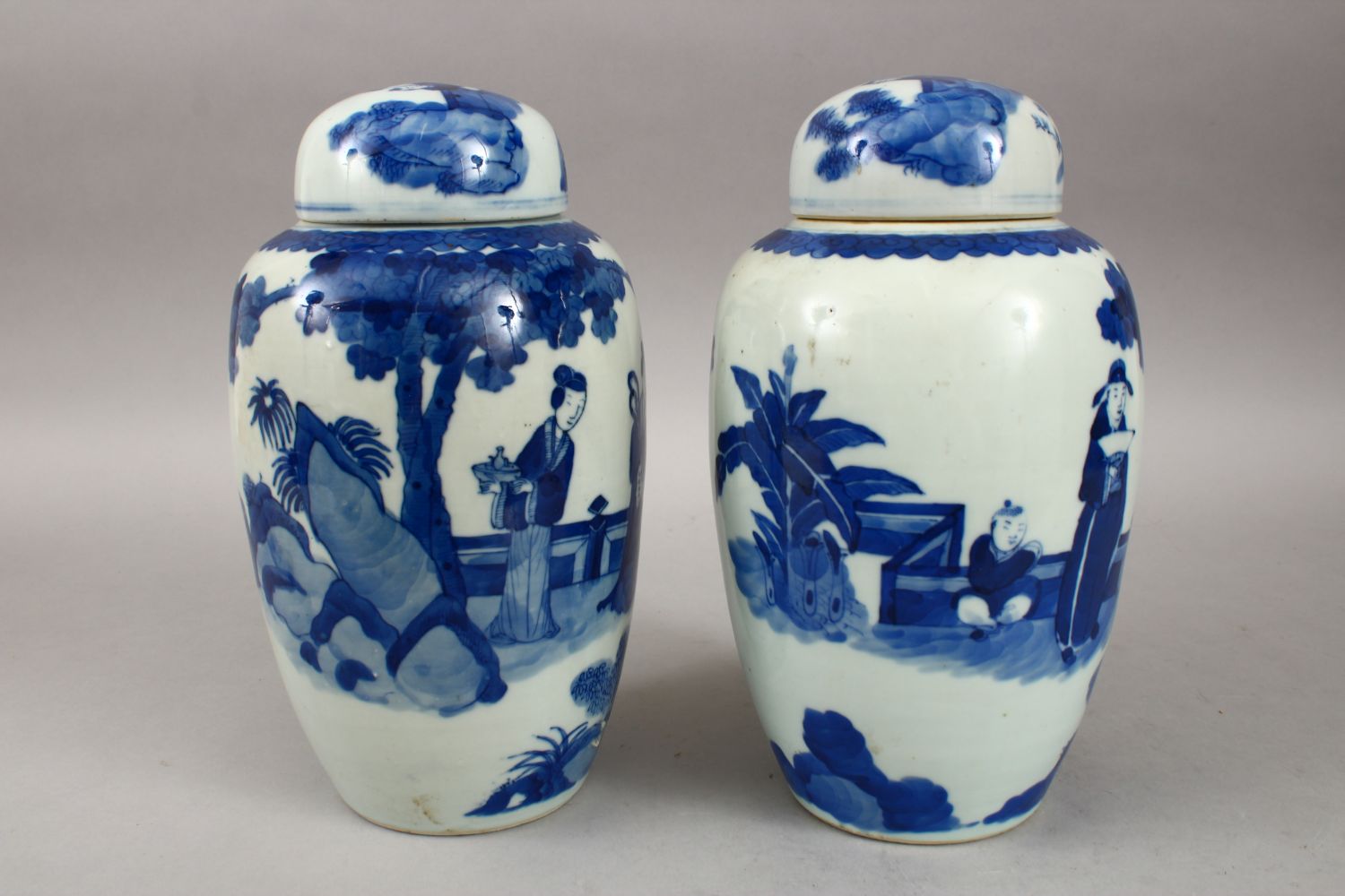 A PAIR OF 19TH CENTURY CHINESE BLUE & WHITE PORCELAIN JARS & COVERS, decorated with scenes of - Image 2 of 6