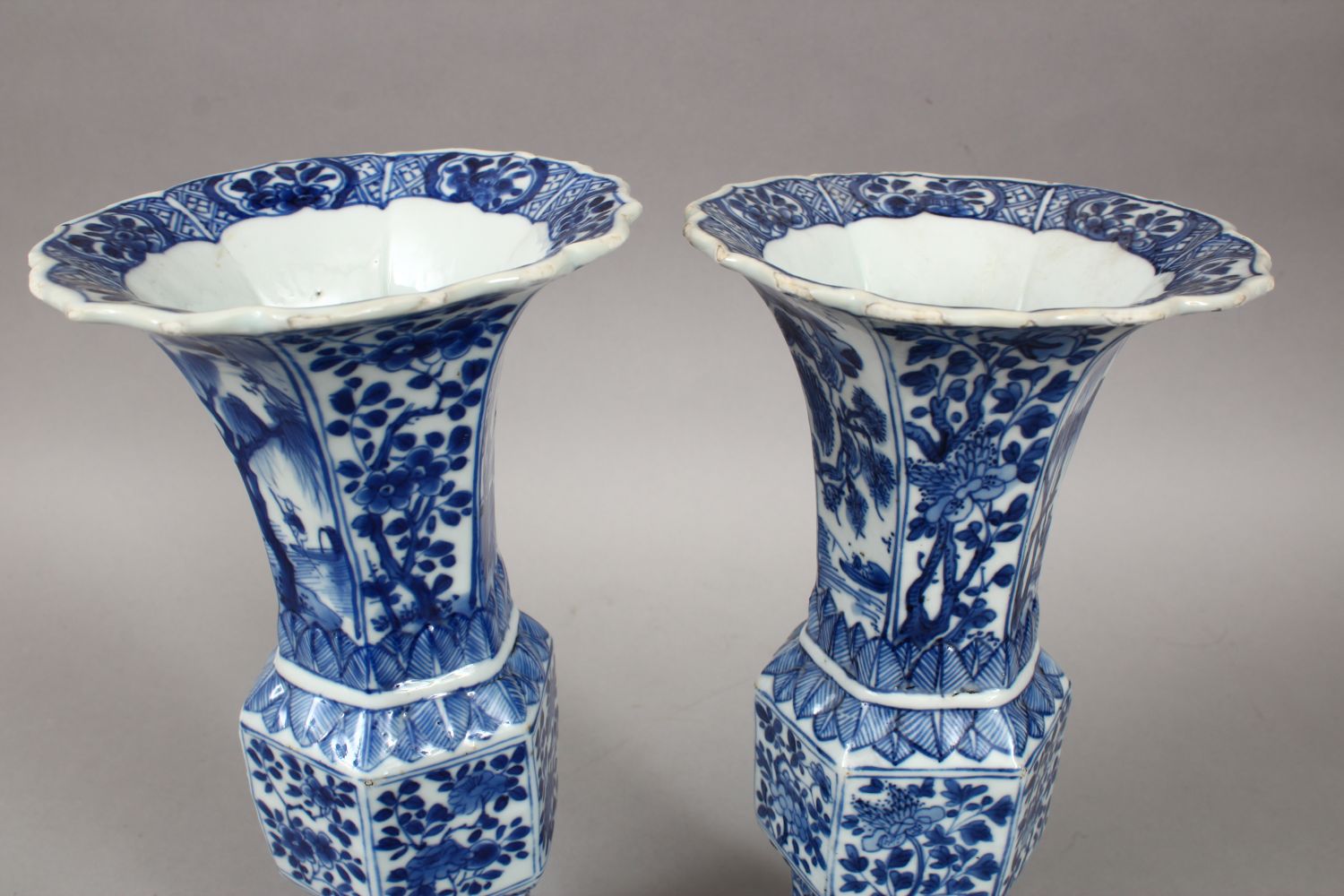 A GOOD PAIR OF 18TH CENTURY CHINESE KANGXI BLUE & WHITE GU SHAPE PORCELAIN VASES, with a multitude - Image 8 of 10