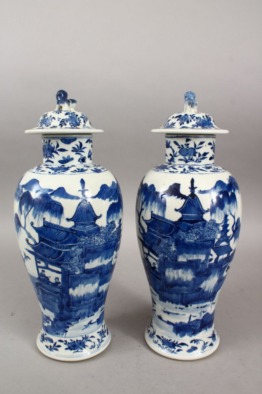 A PAIR OF 19TH CENTURY CHINESE BLUE & WHITE KANGXI STYLE PORCELAIN VASES & COVERS, the body of the - Image 4 of 8