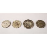 FOUR CHINESE WHITE METAL CURRENCY COINS, 4.5cm, 3.8cm the remaining three.(4)