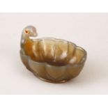 A FINE CARVED AGATE BOWL IN THE FORM OF A BIRD WITH RUBY EYES, 6.5cm x 5cm x 4cm high.
