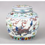 A GOOD CHINESE DOUCAI PORCELAIN EROTIC JAR & COVER, the body of the jar decorated with dragon beasts