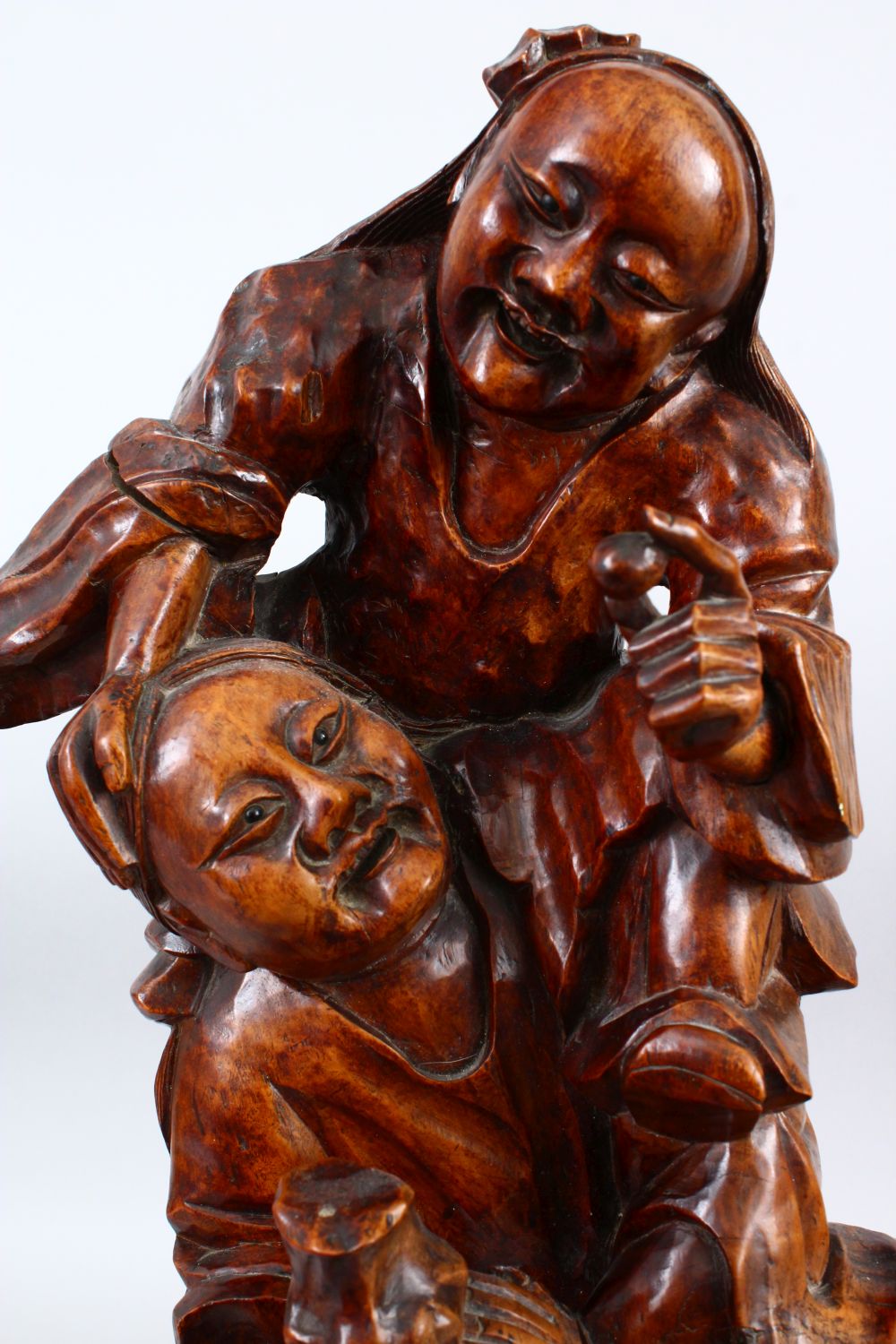 A LARGE 19TH / 20TH CENTURY CHINESE CARVED HARDWOOD FIGURE OF TWO MEN, one upon the shoulders, - Image 2 of 6